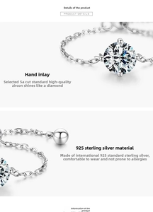 Macro shot of 925 sterling silver chain with a sparkling 5A round zircon and polished bead