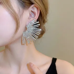 Exaggerated fan-shaped silver drop earrings with shimmering pavé rhinestones for women