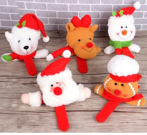 Collection of plush Christmas slap bracelets featuring Santa, reindeer, and snowman designs