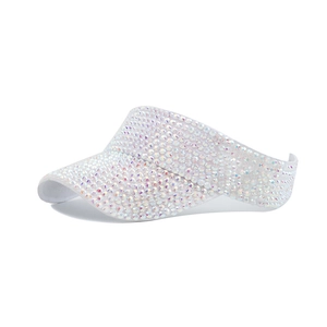 Detail view of white sun visor hat with sparkling rhinestones for outdoor fashion
