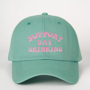 Mint green cotton baseball cap with pink Support Day Drinking embroidery on a white background