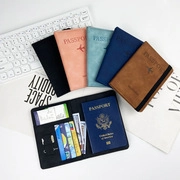 Detail view of colorful PU leather passport holders with functional card and cash slots