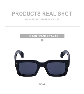 Front view of black square frame sunglasses with gold diamond rivets and gray lenses