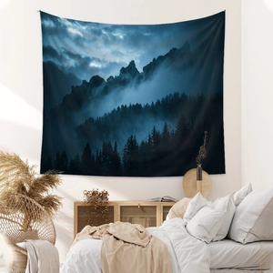 Modern Bohemian forest tapestry showing misty mountains and pine trees for wall decor