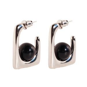 Modern silver geometric square earrings with black onyx bead in a minimalist style