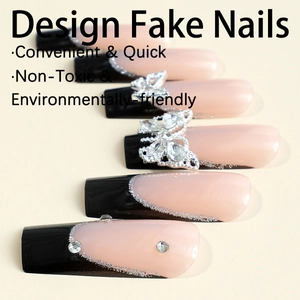 Extra long French press-on nails with pink black gradient and silver butterfly charms