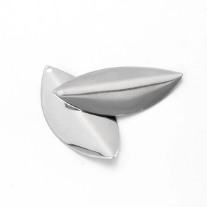 Macro shot of silver stainless steel leaf-shaped pendants with smooth polished finish