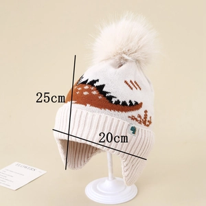Detail view of winter knitted hat showing dimensions 25cm by 20cm with dinosaur pattern