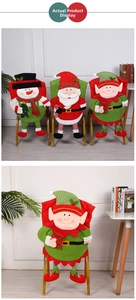 Three festive Christmas chair covers featuring Santa, snowman and elf figures for dining room