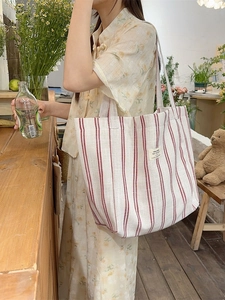 Large capacity canvas tote bag with red vertical stripes and adjustable shoulder handles