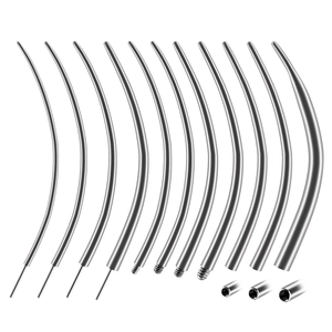 Set of 316L stainless steel piercing guide needles with various tips on white background