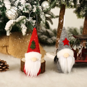 Knitted Christmas faceless gnome ornaments set featuring red and grey hats on a festive tree