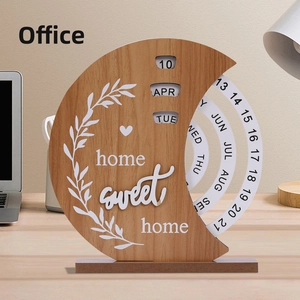Macro detail of crescent wooden perpetual calendar with rotating date rings on office desk