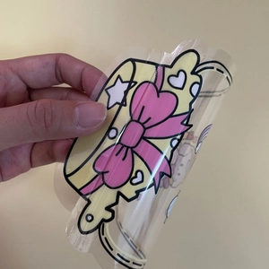 Cute transparent cartoon resealable packaging bag with a pink bow and heart pattern