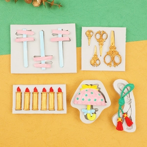 Detailed silicone molds for DIY fondant cakes featuring umbrellas, road signs, and scissors