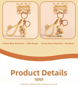 Detail showing Angel and Chef Cream Bear silicone keychains with woven rope strap