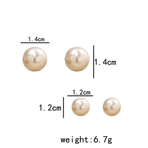 Detailed view of silver needle pearl earrings with size dimensions 1.2cm and 1.4cm