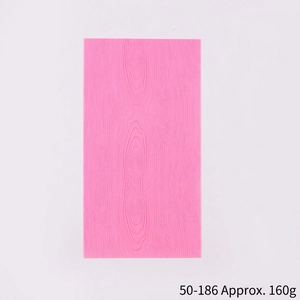 Macro detail of pink silicone fondant mat with realistic tree bark texture 43x23cm