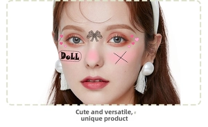Close-up of pink heart and doll face tattoo stickers on a model for party makeup