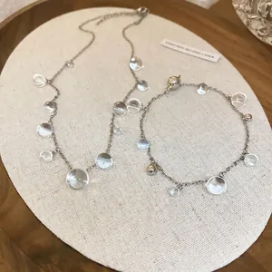 Ensemble collier et bracelet en acier inoxydable avec perles de résine irrégulières