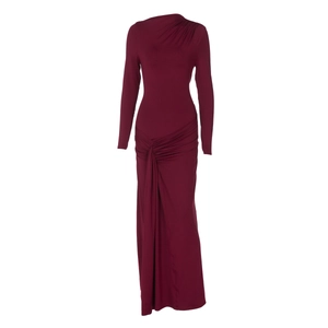 Detail of burgundy long sleeve dress featuring waist knot pleats and front slit design