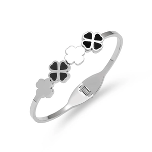 Silver stainless steel clover bracelet with black enamel inlays and a spring clasp