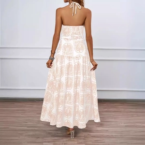 White halter backless maxi dress with floral print for beach vacation bohemian style