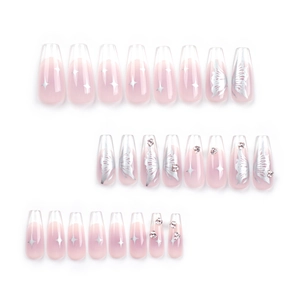 Pink gradient press-on nails with silver butterfly, star motifs and rhinestone accents