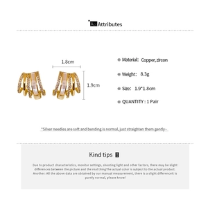 Detail showing C-shaped earrings size and specifications with zircon and copper material