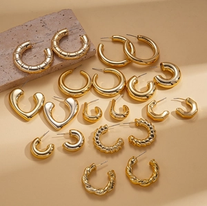 20-piece gold geometric earring set featuring smooth hoops and twisted metal designs