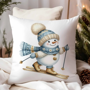 Détail de la housse de coussin bonhomme de neige dans un décor de Noël chaleureux