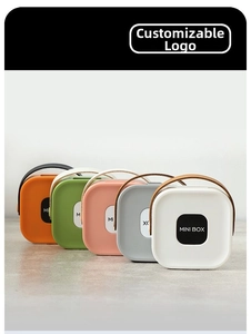 Detail of portable mini storage boxes with side handles in five vibrant assorted colors