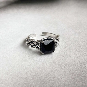 Minimalist S925 sterling silver ring with woven texture and a black square gemstone