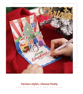 Weihnachten 3D Pop-up Grußkarte Detail mit süßem Cartoon Weihnachtsmann und Tannenbaum.