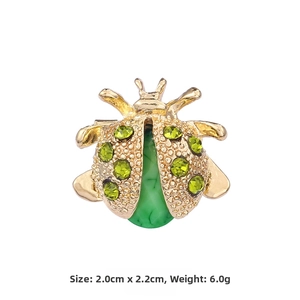 Detailed view of ladybug brooch showing dimensions 2.0cm by 2.2cm and 6g weight