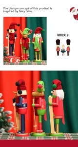 Detailed view of three 30cm wooden Christmas nutcrackers with skiing gear and winter outfits