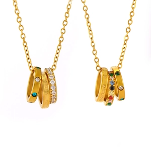 Three-ring layered necklace with multicolor zircons and 'With Love' engraving in gold