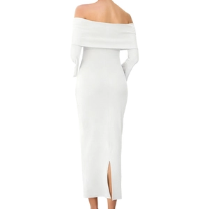 Detail view of the back of a slim fit white off-shoulder long dress with high slit