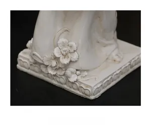 Detailed relief of small flowers on the ivory resin base with vintage textures