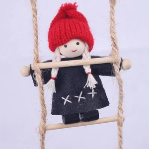 Handmade wool felt girl doll on wooden rope ladder for Christmas tree decor
