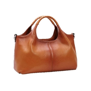 Brown lychee grain leather tote bag with woven handles and large capacity design