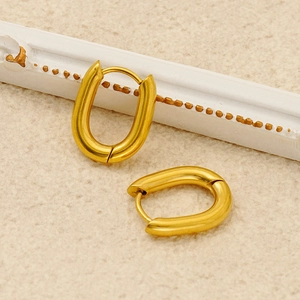 Close-up of geometric U-shaped earrings in polished 18k gold plated stainless steel