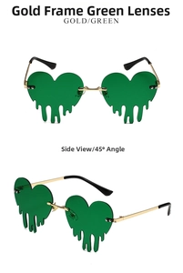 Detail of gold metal frame sunglasses with green lava drip heart shaped lenses