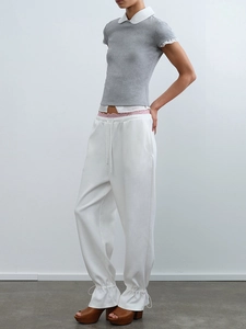 Slim-fit gray knit short sleeve t-shirt paired with white wide-leg drawstring sweatpants