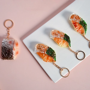 Porte-clés réaliste en résine motif filet de poisson et texture saumonée avec anneau
