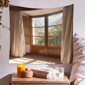 Detail of cozy wall tapestry with scenic mountain view and soft fabric texture