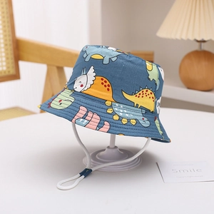 Dark blue kids bucket hat with colorful cartoon dinosaur prints and adjustable chin strap