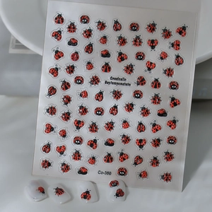Detailed 5D relief ladybug nail art stickers with intricate Coccinella patterns