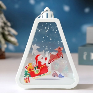 White Christmas lantern with Santa and reindeer scenes against a blue bokeh background