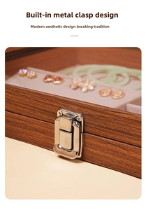 Macro view of walnut wood jewelry box with silver metal clasp and purple velvet lining